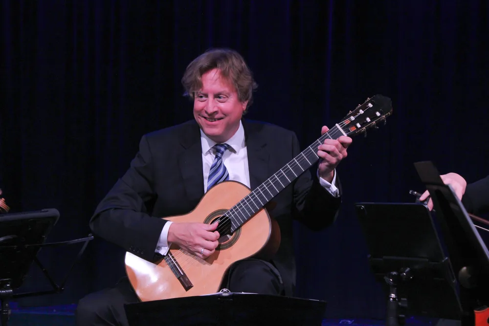 A guitarist performing, 2025