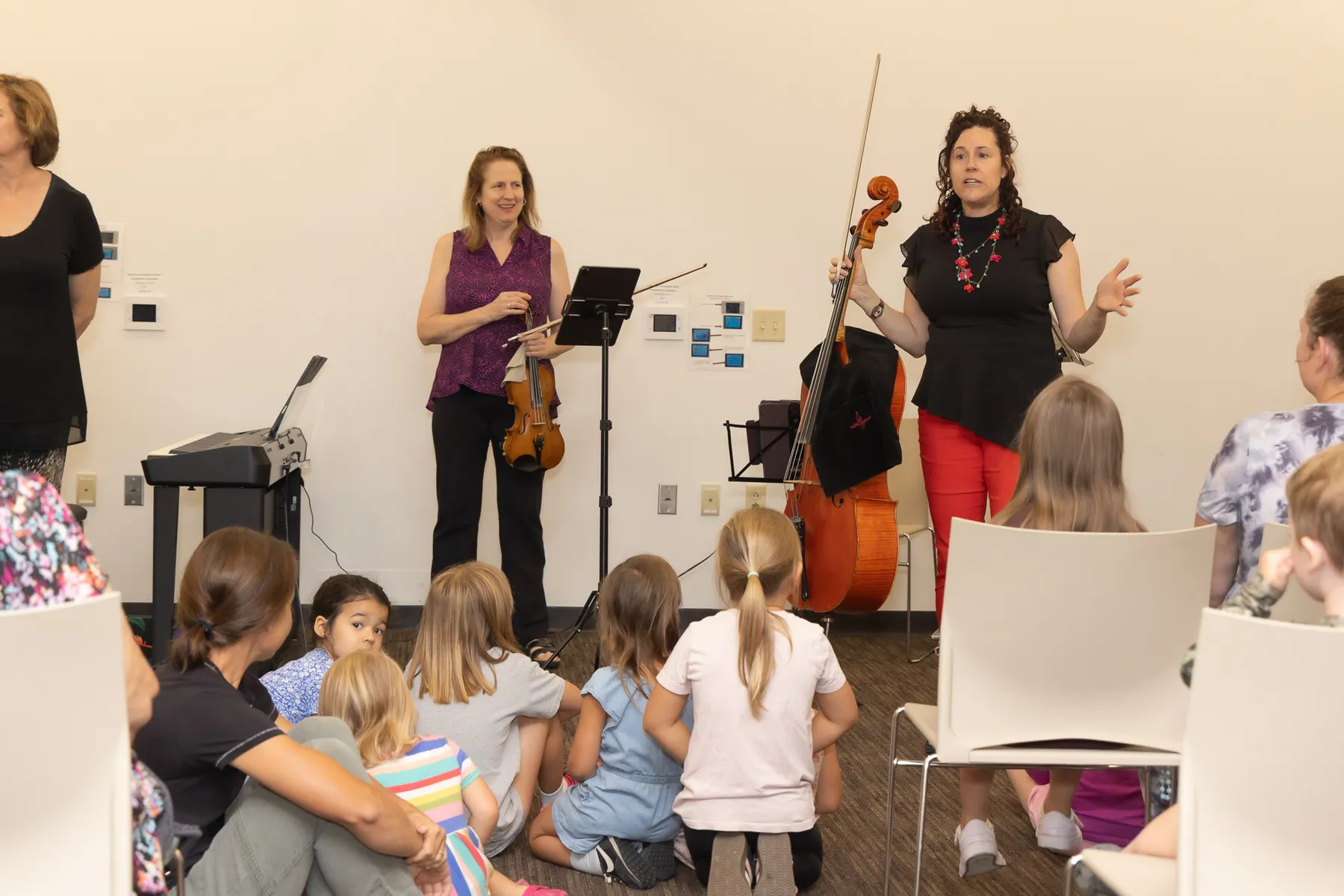 Musicians performing for children at Wood Library